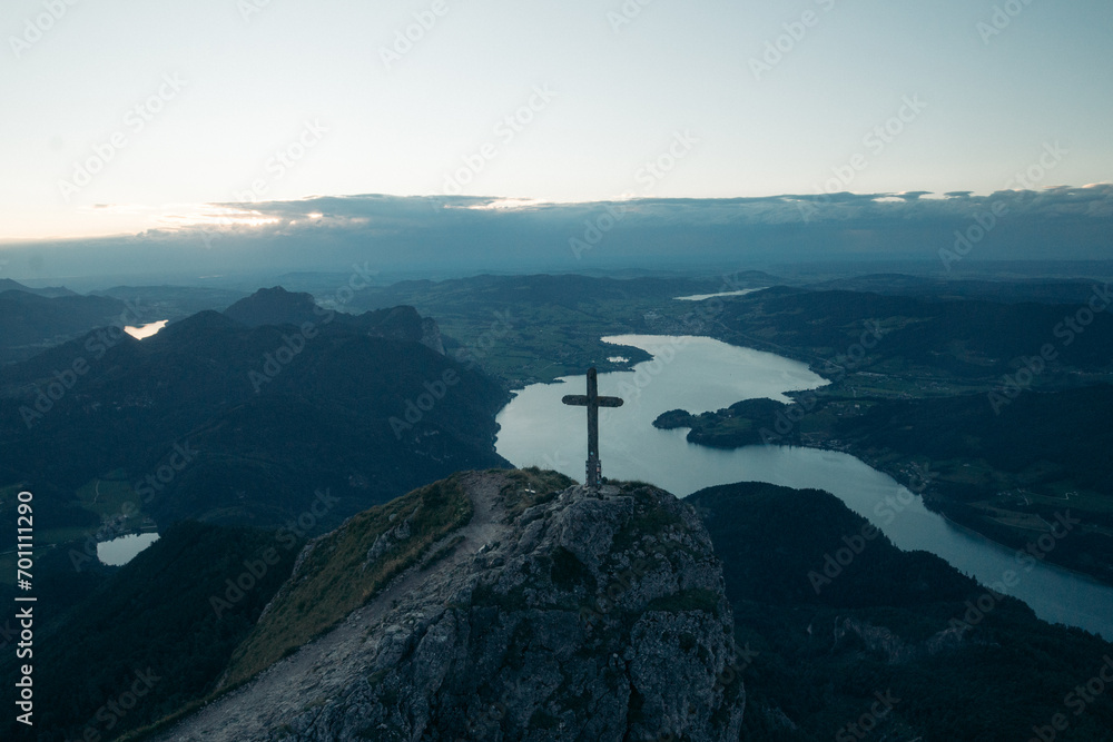 Schafberg mountain top with cross at sunset, Salzburg Land, Austria