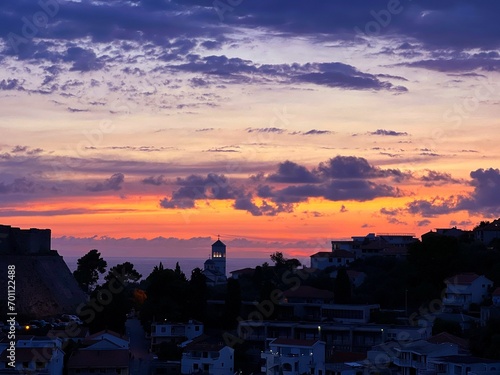 Night sunset sky clouds over town in Montenegro © OLENA