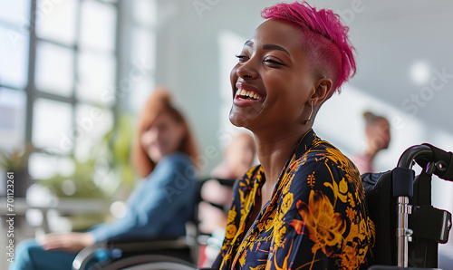 Inclusive happy smiling black African American disabled office LGBTQ+ queer female wheelchair bound colleague, pink lesbian afro hair, bright diverse deib positive workplace, candid afro american photo