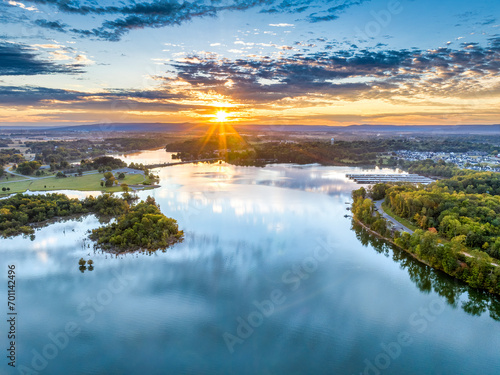 Aerial view of a beautiful morning sunrise sky and water reflection over the mountain and lake  marina and Bass Club on beautiful Tims Ford Lake in Winchester Tennessee