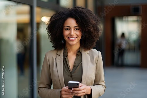 Confident Professional Woman Using Smartphone in Corporate Setting