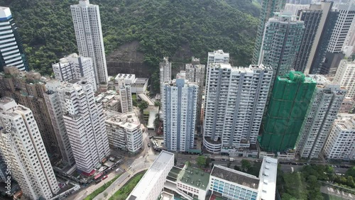 Aerial drone skyview of the residential and commercial area in Hong Kong East District at Victoria Harbour, near Kings Road in Tai Koo Shing and North Point Quarry Bay Shau Kei Wan Sai Wan  photo