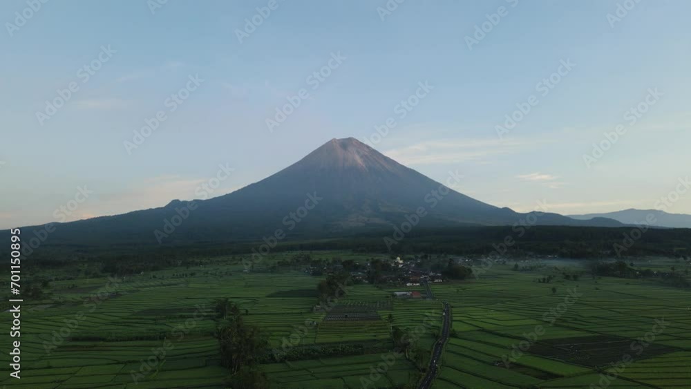 drone flight over landcape of mount, volcano Semeru, Jawa. Indonesia. Sunny day with a clouds around volcano drone flight over landcape of mount, volcano Semeru, Jawa. Indonesia. Sunny day with a clouds around volcano