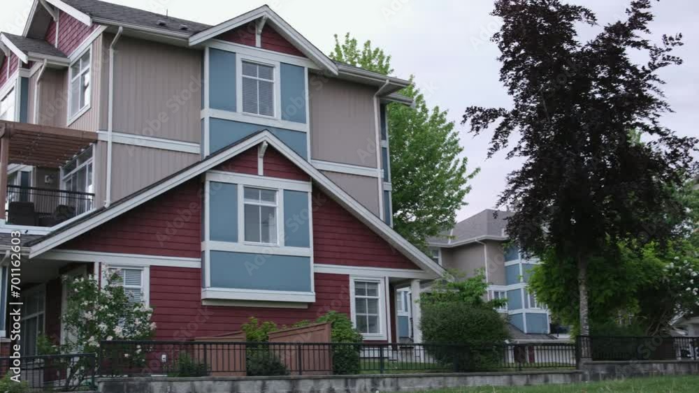 Custom built big luxury house with triple garage doors in a residential neighborhood. Suburbs of Vancouver Surrey Canada. Custom built big luxury house with triple garage doors in a residential neighborhood. Suburbs of Vancouver Surrey Canada.