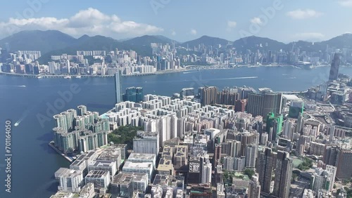 Aerial View of the skyline of Hong Kong Victoria Harbour Hung Hom Whampoa Ho Man Tin To Kwa Wan Sung Wong Toi Tsim Sha Tsui East Kowloon Peninsula,a commercial hub with the financial business  photo