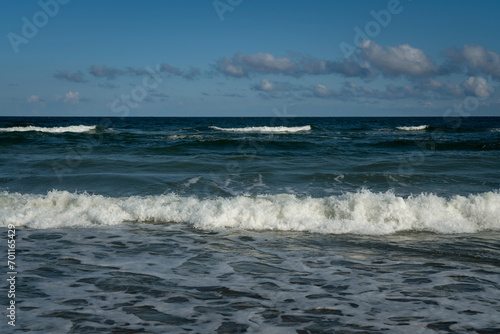 View of the incoming wave on the Baltic Sea on the shore of the Curonian Spit on a summer day  Kaliningrad region  Russia