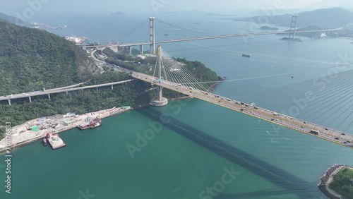 Drone Aerial Skyview in Highway Flyover Traffic on Ma Wan Sham Tseng Tsuen Wan Tsing Yi Tuen Mun Road Hong Kong Tsing Ma suspension Bridge, Ting Kau bridge photo