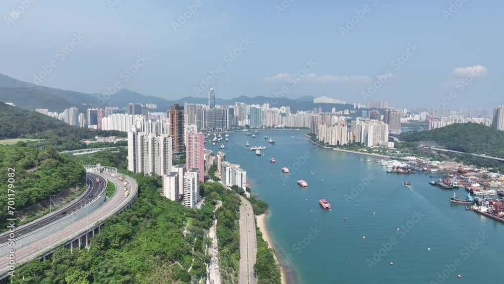 Tsuen Wan Kwai Chung and Tsing Yi ,a commercial and residential seaside satellite town, built on a bay in New Territories of Hong Kong, Aerial drone City skyview Tsuen Wan Kwai Chung and Tsing Yi ,a commercial and residential seaside satellite town, built on a bay in New Territories of Hong Kong, Aerial drone City skyview