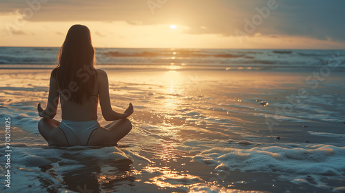 meditation woman illuminated on beach