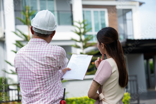 Senior home inspector explains Inspection results with homeowner, handyman holding clipboard and after checking details before renovations home, house improvement interior, Interior design Real estate