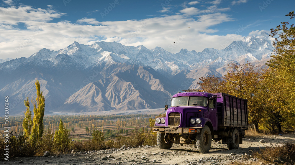 Mystic purple truck against Skardu's breathtaking mountains.