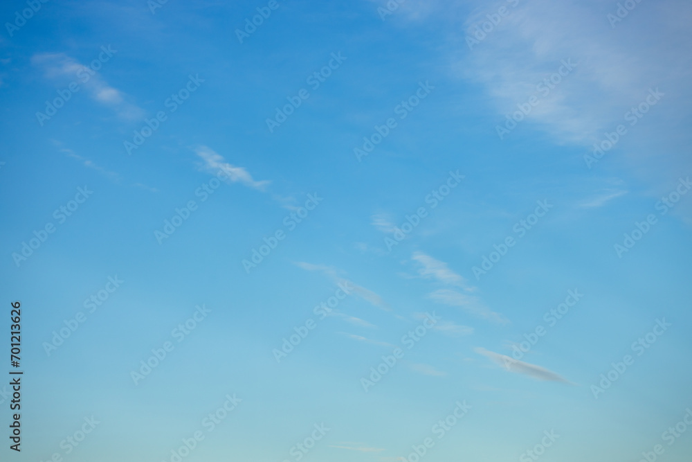 A beautiful sky tinted by the sun leaving vibrant shades of gold, pink, blue and multicolored. Clouds in the twilight evening and morning sky. Cloudy sky background in the evening and during the day. A beautiful sky tinted by the sun leaving vibrant shades of gold, pink, blue and multicolored. Clouds in the twilight evening and morning sky. Cloudy sky background in the evening and during the day.