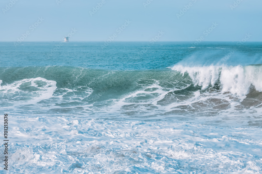 Wave splashing close-up. Crystal clear sea water, in the ocean in San Francisco Bay, blue water, pastel colors. Wave splashing close-up. Crystal clear sea water, in the ocean in San Francisco Bay, blue water, pastel colors.