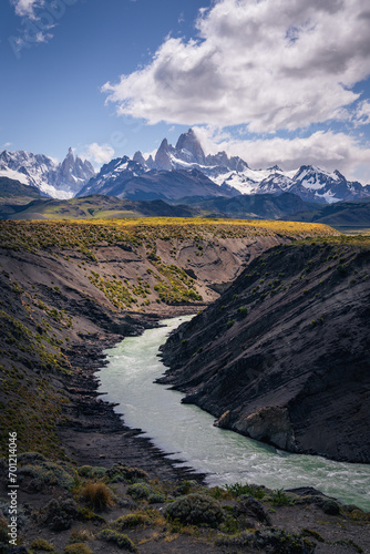River leads to el chalten, beautiful fitz roy, cerro torre, dramatic sky sunlight, and cloud (Argentina)