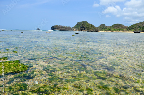 Beautiful Beach with white sand and clear skyline in Malang photo