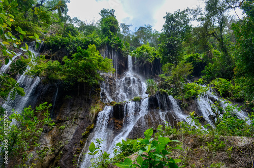Beautiful waterfall with very beautiful scenery and shady trees