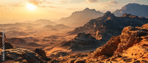 Rocky Mountains in Al Ula Desert at Sunset photo