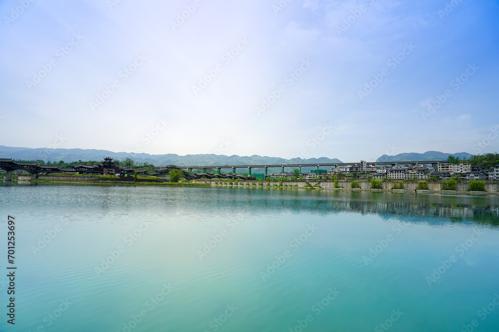 The town is surrounded by mountains, the river reflects the beautiful scenery. Zhoushui Ancient Town is a historical and cultural attraction. Chongqing, China.