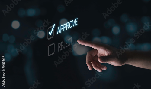 Hand touching to tick correct sign mark symbol for project approval and document approve concept. photo
