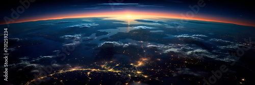 Earth as seen from space, where glowing city lights blend with celestial radiance and wisps of light clouds. photo