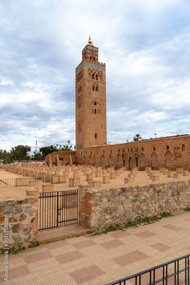 Photo of the exterior of the Koutoubia mosque in the city of Marrakech, cloudy day.