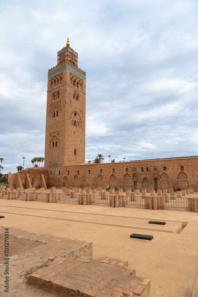 Photo of the exterior of the Koutoubia mosque in the city of Marrakech, cloudy day.