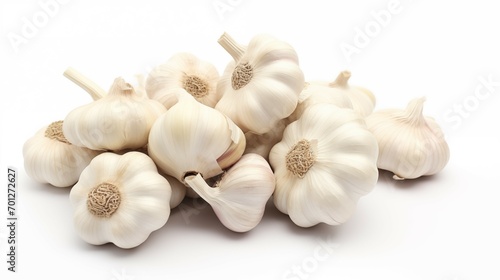 Healthy diet. Vegetables. A handful of garlic on white background. Isolated