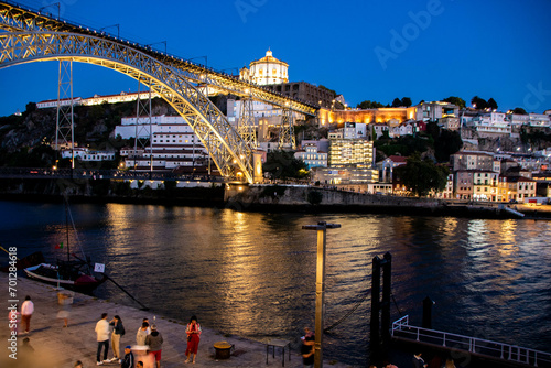 Dom Luis bridge and Douro riverbank in Porto