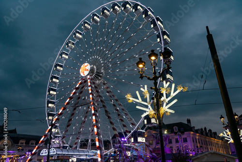 Night view of Orleans' Ferris wheel, on place Martroi, France photo