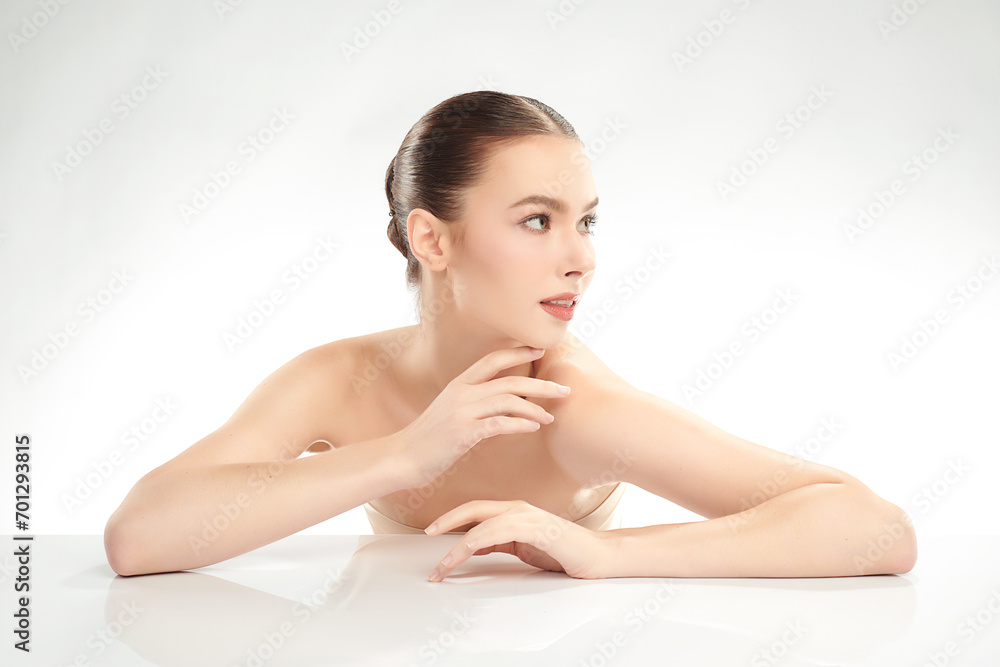 Beautiful young woman with clean fresh skin on white background, Face care, Facial treatment, Cosmetology, beauty and spa, women portrait. Beautiful young woman with clean fresh skin on white background, Face care, Facial treatment, Cosmetology, beauty and spa, women portrait.