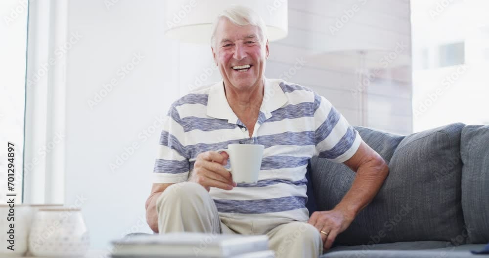 Face, laugh and senior man with coffee on sofa relax, free and chilling at home on weekend. Happy, portrait and elderly male person enjoy retirement in a living room with tea while resting in a house Face, laugh and senior man with coffee on sofa relax, free and chilling at home on weekend. Happy, portrait and elderly male person enjoy retirement in a living room with tea while resting in a house