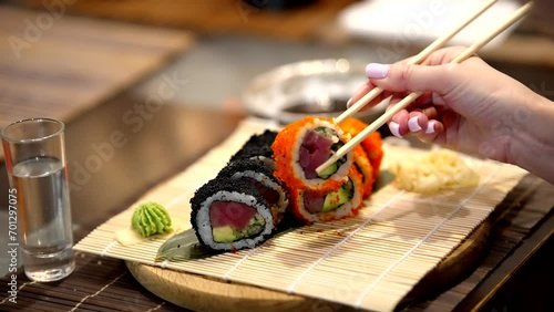Chopsticks for sushi in Japan . Sushi Maki rolls photo
