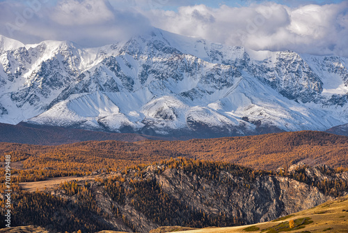 Altai Republic. North Chuysky ridge. Mountains covered with snow during sunrise. Mountain landscape.