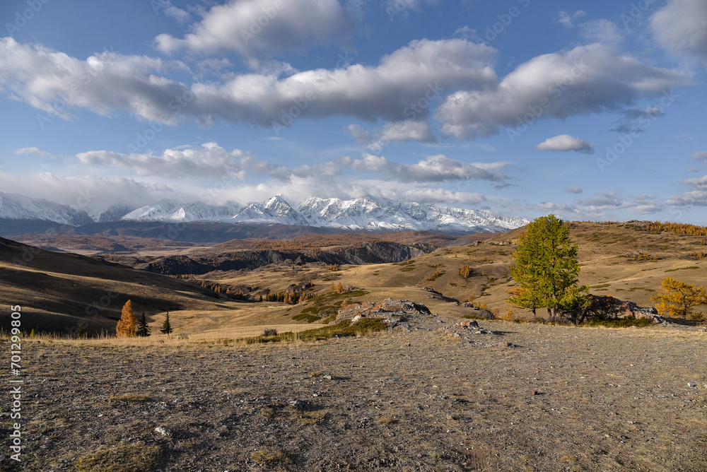 Obraz premium Altai Republic. North Chuysky ridge. Mountains covered with snow during sunrise. Mountain landscape.