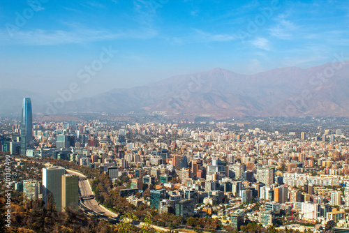 city skyline Chile, view of the santiago buildings and the mapocho river photo