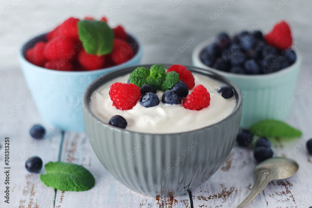 A bowl with Greek yogurt with berries A bowl with Greek yogurt with berries