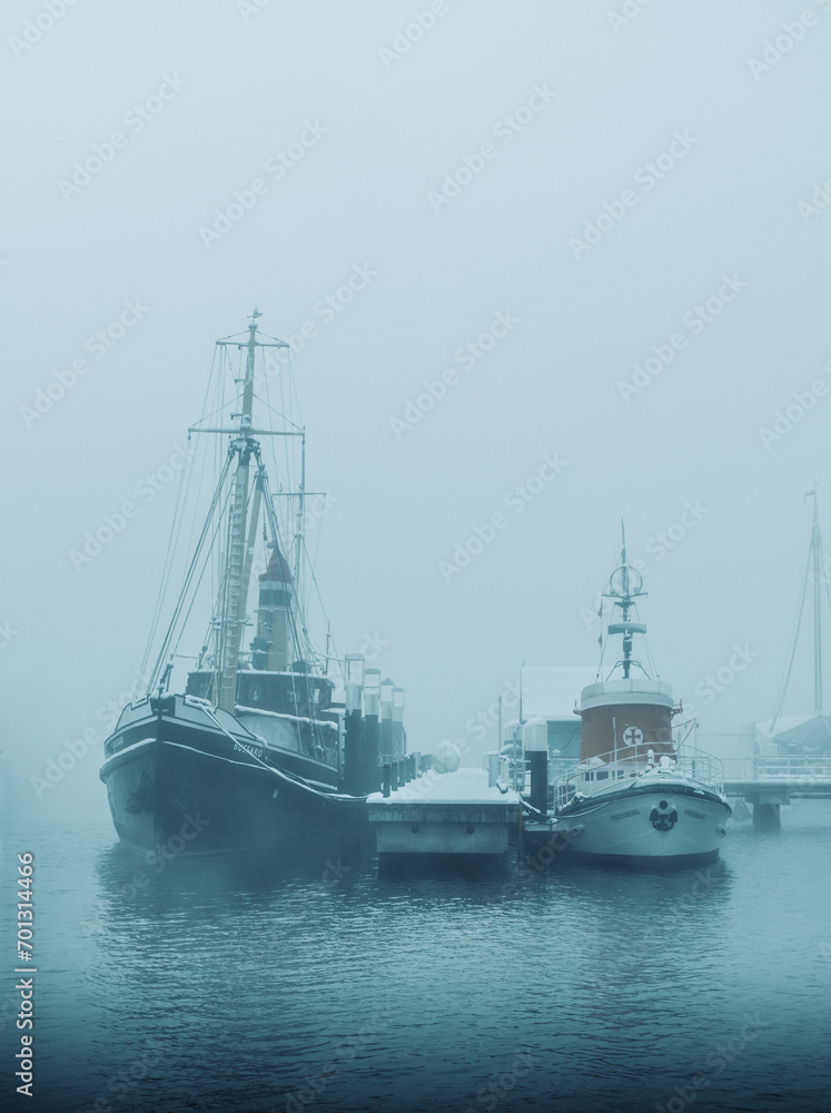boats moored on a cold day