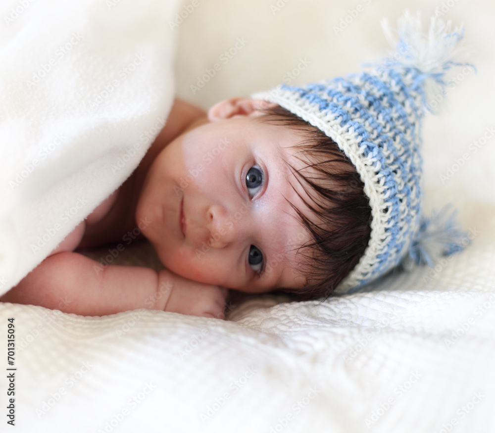 Portrait of a baby in knitting hat Portrait of a baby in knitting hat