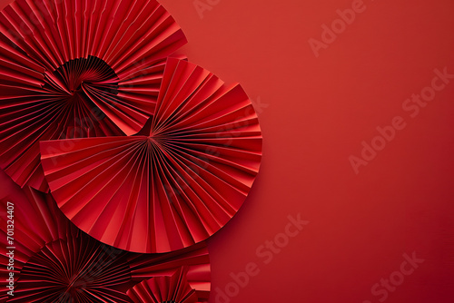 Chinese new year festival or wedding decoration over red background. Traditional lunar new year paper fans. Flat lay  top view  banner