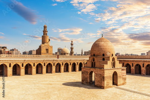Minaret and ablution fountain of the Ibn Tulun Mosque, colourful view of old Cairo, Egypt