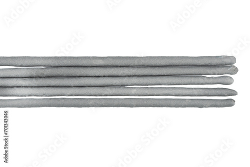 Close-up of several unlit sparklers isolated on a white background. photo