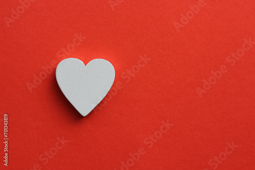 white heart on a red background
