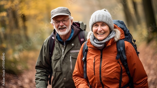 Aged couple hiking in a scenic mountain landscape   aged couple  hiking  scenic mountain landscape.