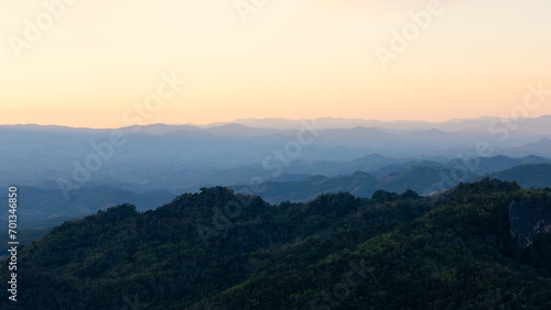 Beautiful mountain layers and clear sky with sunlight at Doi Samer Dao (Srinan National Park). © aam460