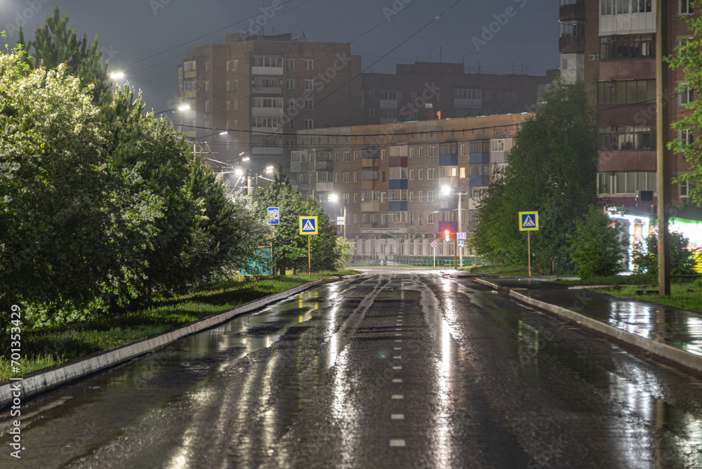City street at night during the rain.