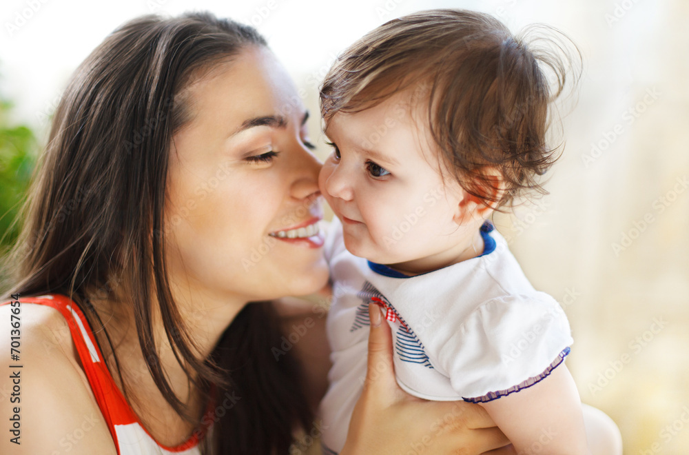 Happy smiling mother with baby girl indoor Happy smiling mother with baby girl indoor