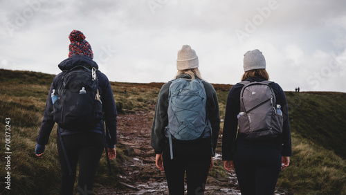 group of people hiking in mountains