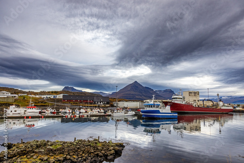 Djupivogur, a small coastal village and fishing community in Eastfjords, Iceland. The Bulandstindur mountain is in the background. photo