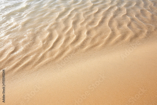 A very beautiful beach with light sand and a paradisiacal beach sea