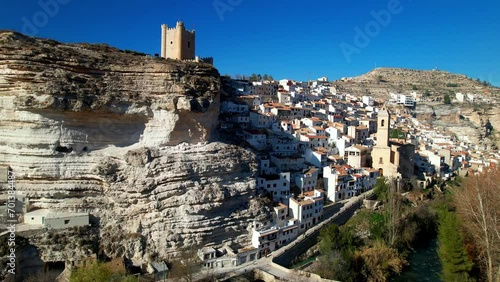 Spain, Alcala de Jucar - scenic  medieval village located in the rocks. Aerial drone high angle view with the castle and bridge photo